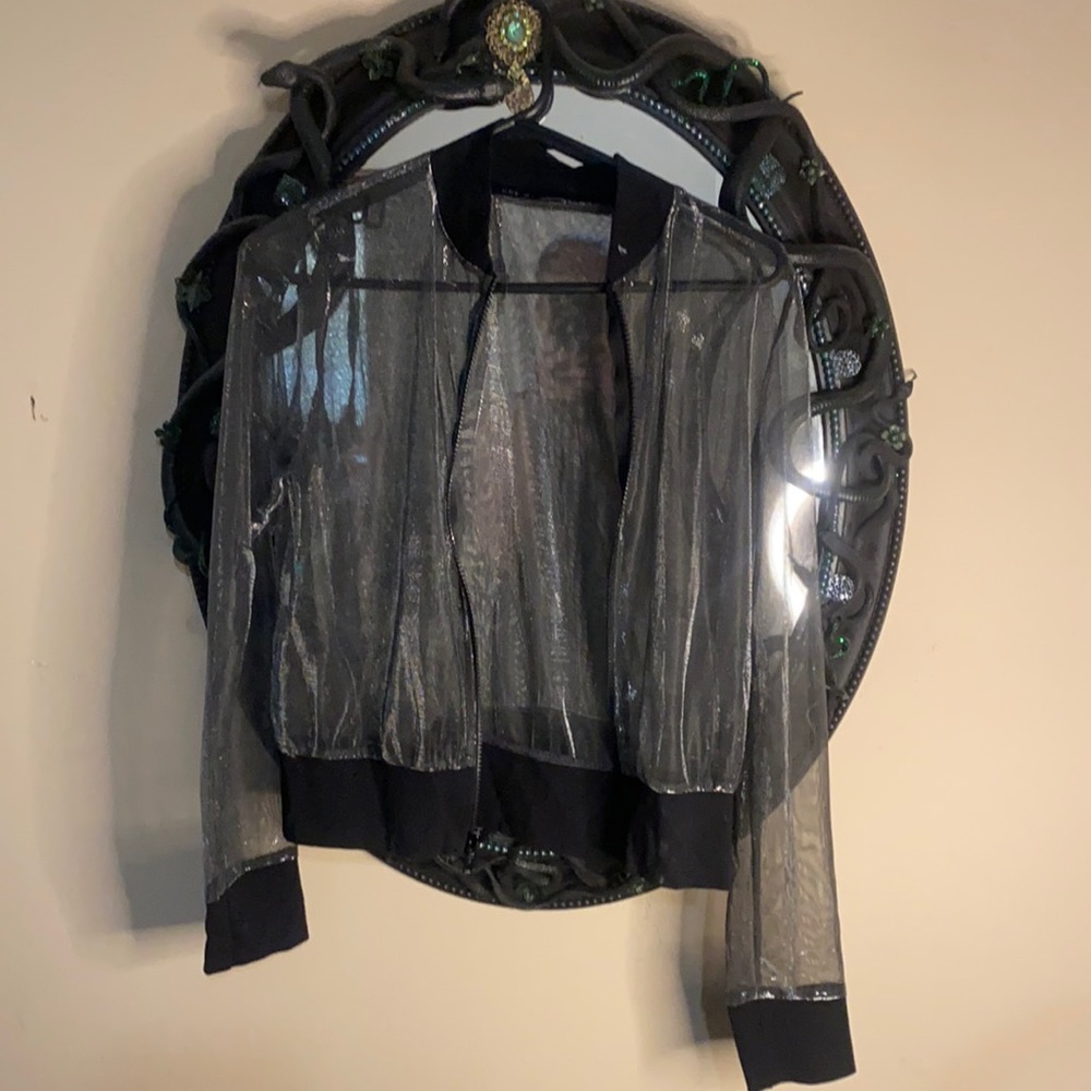 Beautiful see-through jacket from DollsKill